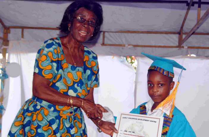 Top preschooler receives certificate from top Accra Preschool in Dzorwulu Accra, Ghana