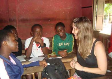 Ghana volunteer Angela with Ghanaian teen girls